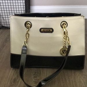Black, white, and gold Anne Klein purse